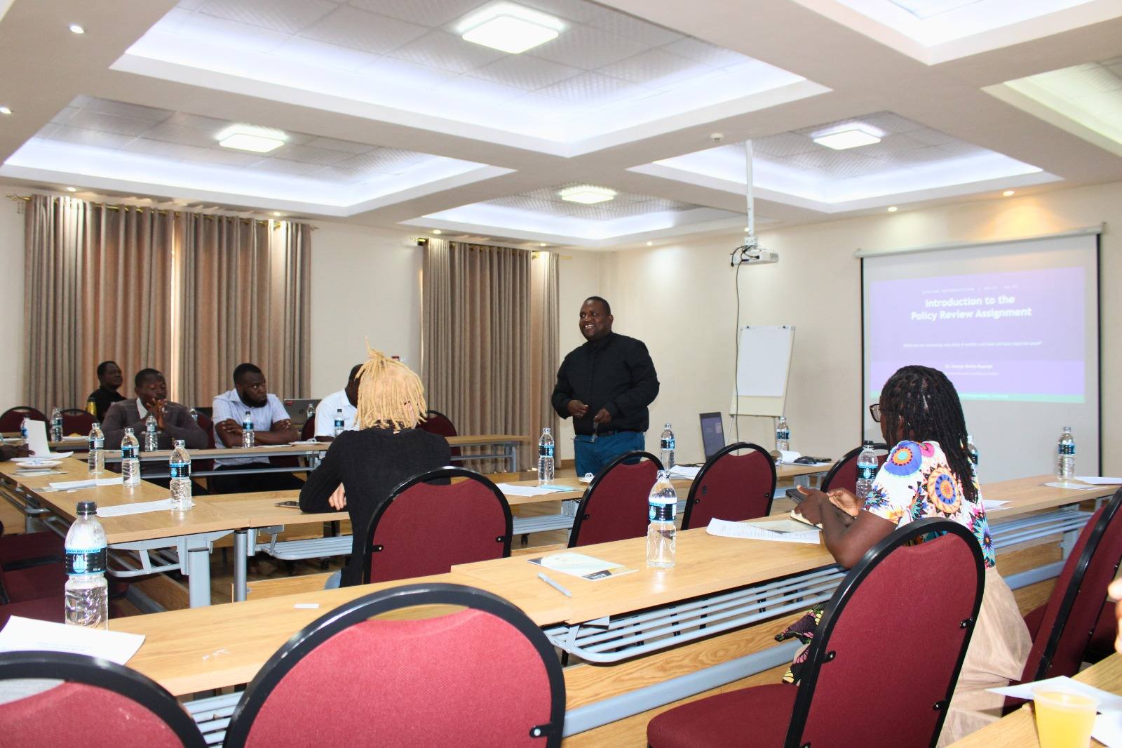 Dr. George Kayange facilitating at the combined Lilongwe and Dowa District consultation meeting